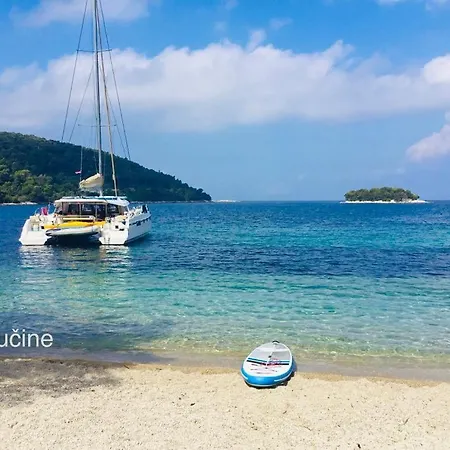 Huck Finn Catamarans * Komolac